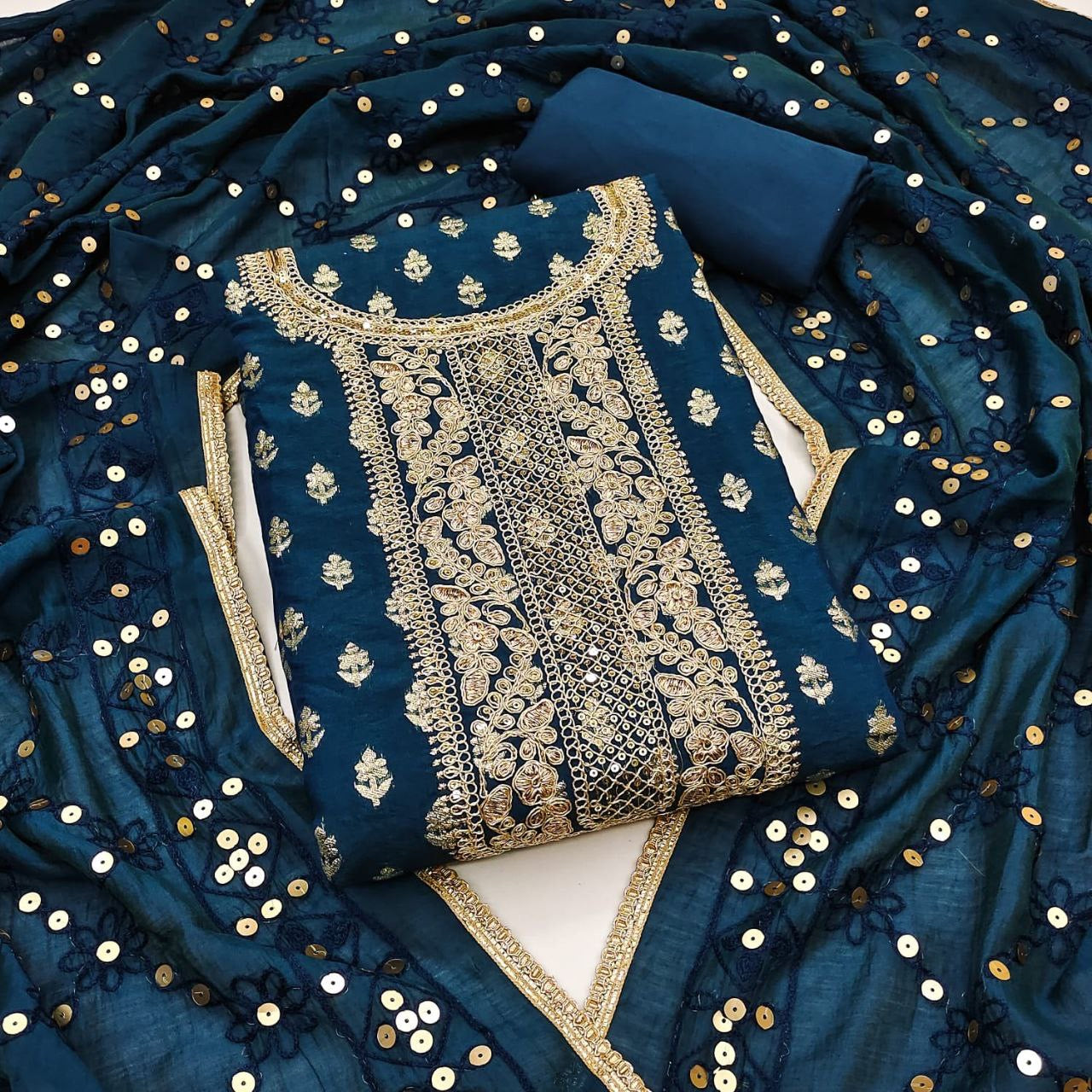 Top Fabrics:-CHANDERI SUIT SET ~| LUXURY EMPORIUM