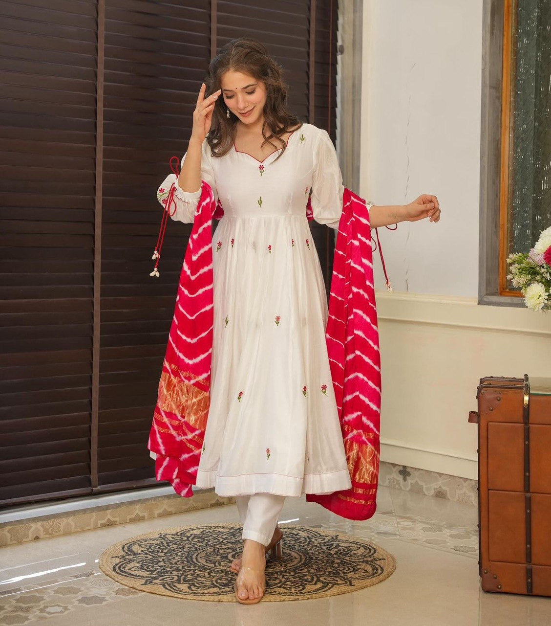 White Anarkali with red bandhej dupatta