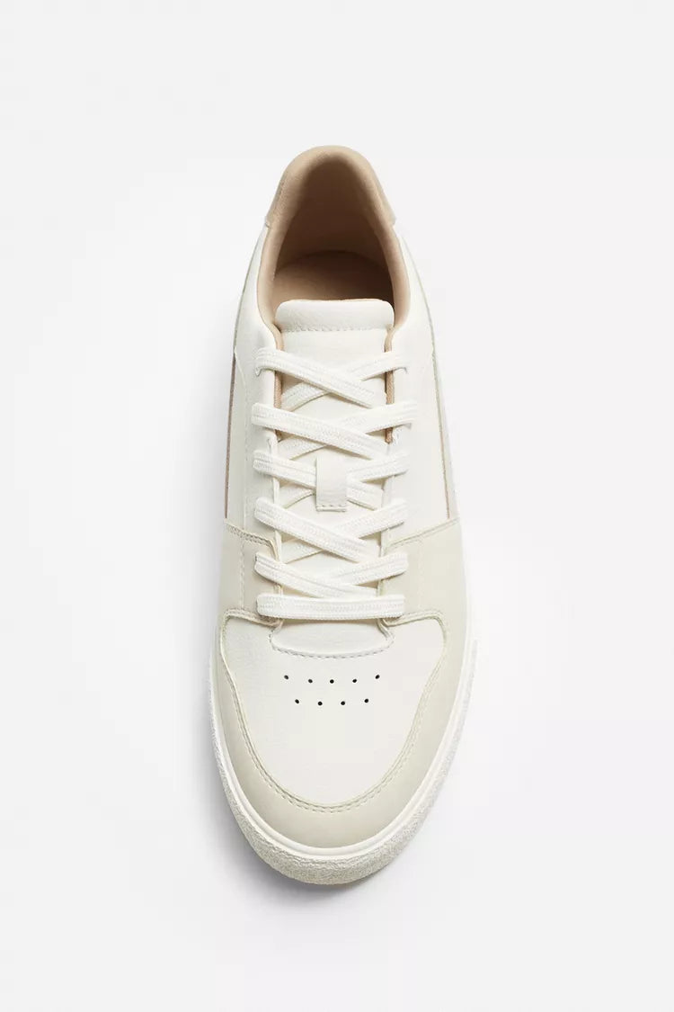 White Basic Sneakers | Zara | Retro trainers. Mixed-material upper. Six-eyelet facing. Flat, textured sole.| RAW | LUXURY EMPORIUM