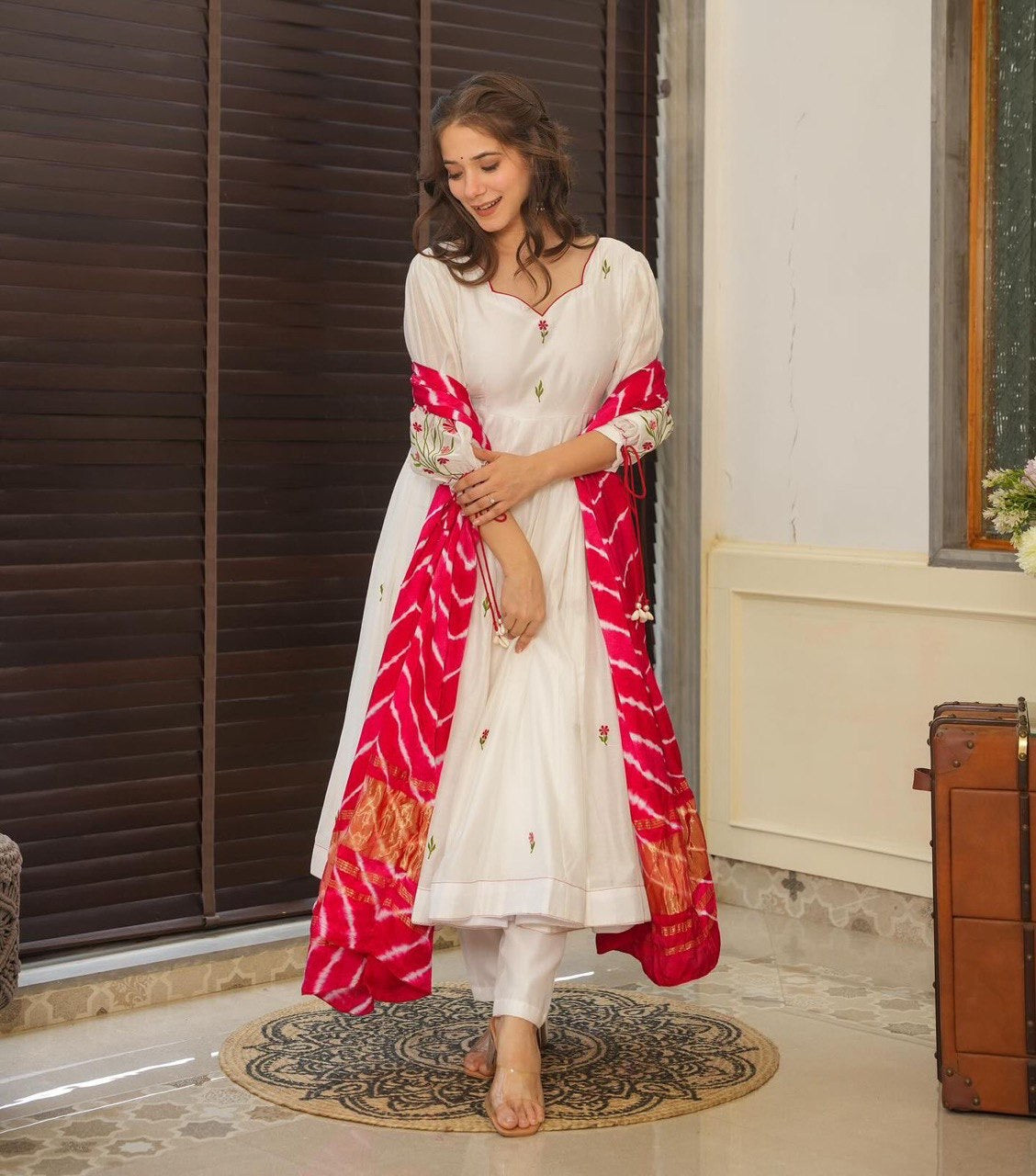 White Anarkali with red bandhej dupatta
